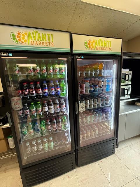 Avanti Markets drink coolers stocked with soda and bottled beverages